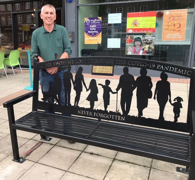 Cllr Beckett with Co-Vid memorial bench in Stoneleigh