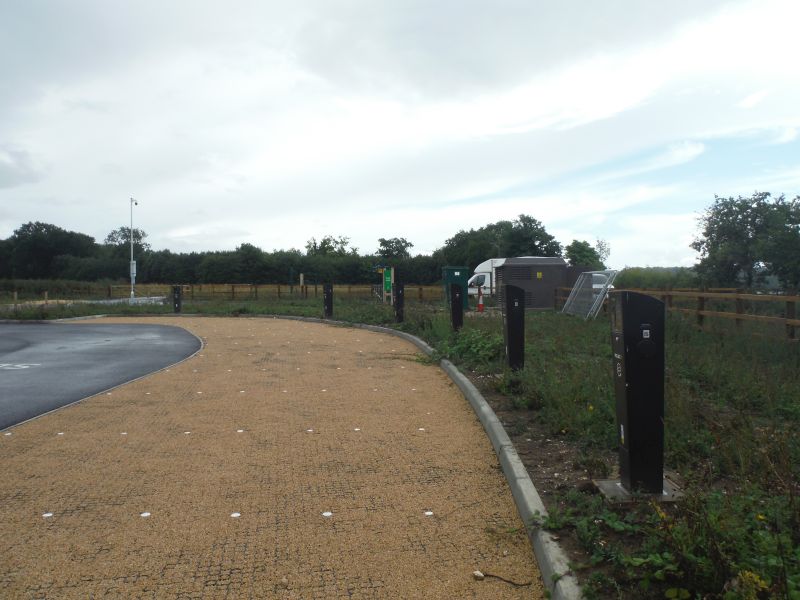 Line of Electric vehicle charging stations at langley Vale centenary WQood car park