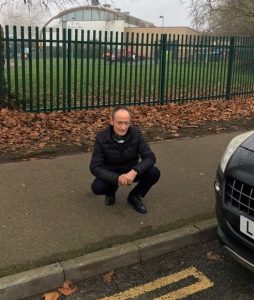 Eber Kington by a double yellow line