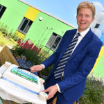 Ben Spencer MP cuts a cake
