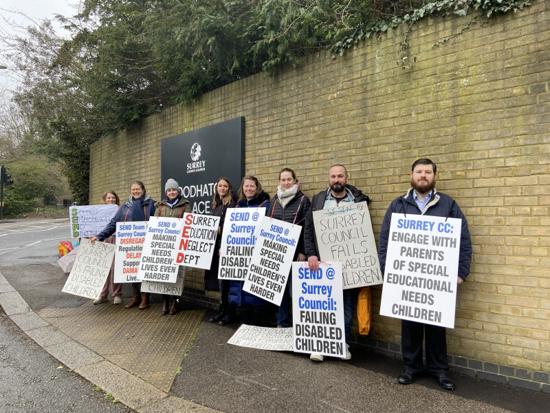 Parents protesting outside Surrey County Council headquarters in Woodhatch Place, Reigate Credit: Emily Coady-Stemp