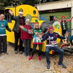 Rotarian Elves welcome the arrival of Father Christmas to Epsom