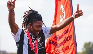 Special olympics athlete with medal