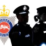 Male and female police officers in Silhouette