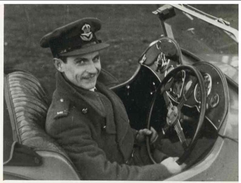 John Williams in a motor car
