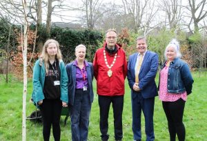 (Centre) The Mayor of Epsom & Ewell, Councillor Rob Geleit at the commemorative tree planting of a silver birch to mark Nescot’s 70th anniversary along with (left to right), Catering student Anna, Principal and CEO of Nescot, Julie Kapsalis, Access to Nursing student, Kirsty and Chair of Nescot Corporation, Chris Muller. Photo credit: Nescot