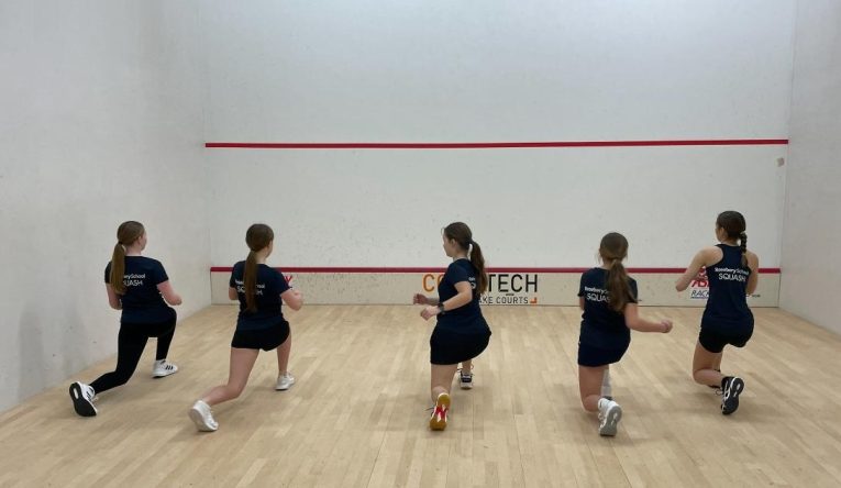 Epsom squash team stand the squeeze