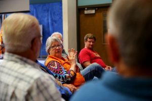 Elderly people at a meeting