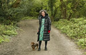 Zehar Hicks and her sausage dog onEpsom Common