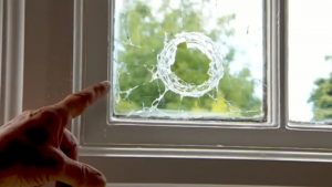 Window broken by ball bearing