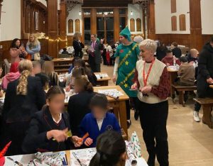 Children refugee and buddies at City of Londn Feeman School