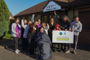 Sinead Mooney, Surrey County Council’s Cabinet Member for Adult Social Care  (second from right), pictured with people who draw and care and support alongside staff from the provider Dramatize, which supports adults with learning disabilities after they leave education, offering a wide range of activities including day provisions and employment and life skills programmes. 