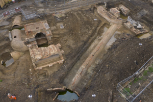 An aerial view of the main excavation looking south-west. It shows the two mill structures and the brick culverts that supplied the water to power them and returned it to the Hogsmill (photo courtesy of Cotswold Archaeology and Aerial-Cam).