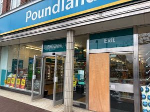 Broken window at Poundland (image Steve Bax)