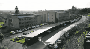 A Surrey County car park with solar panels n roofs.