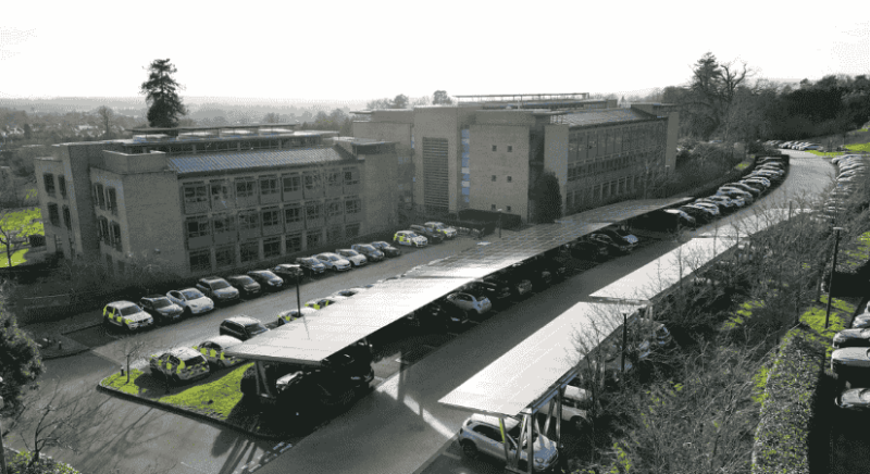 A Surrey County car park with solar panels n roofs.