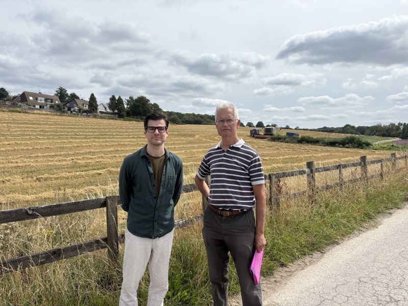 Campaigners, Matt Dunn (left) and John Mumford (right), in front of the proposed development site. (Credit: Emily Dalton/LDRS)
