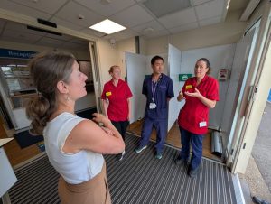 MP Helen Maguire speaks to staff at Epsom hospital