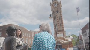 Luna and Analees beside Emily Davison statue in Epsom
