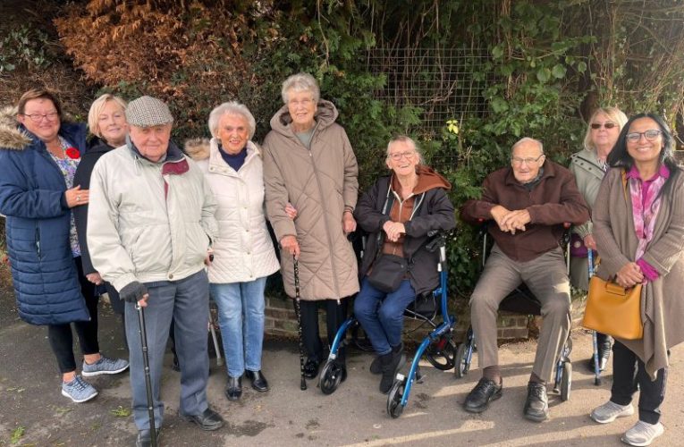 Cllr Neha Boghani right), Green councillor for Horley East, with residents of the Gardens Estate, south Horley, at the ‘ghost bus stop’ where they used to get on the 424 Metrobus (image Cllr Boghani)