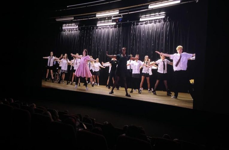 Young performers on stage on film at Epsom Picture House