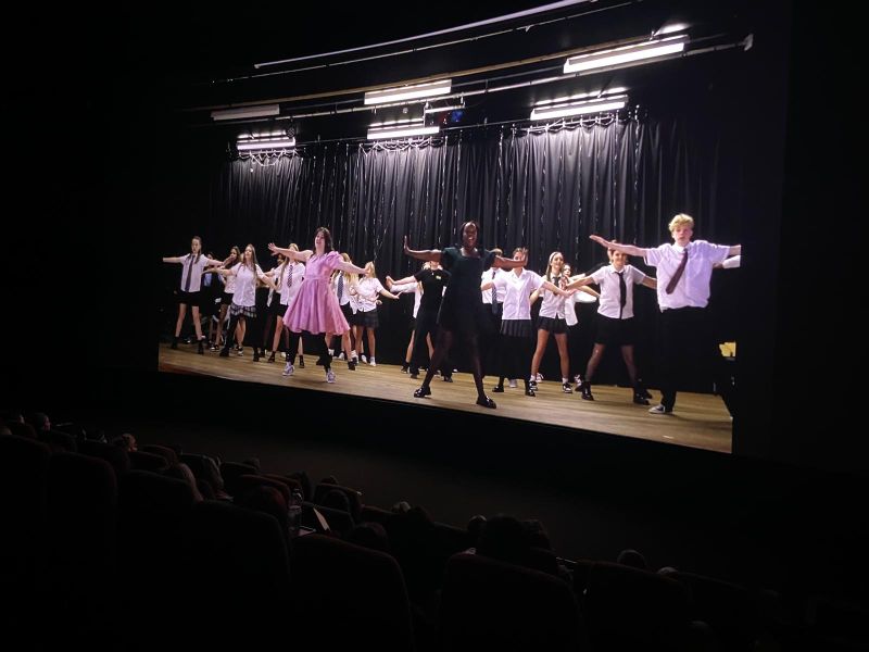 Young performers on stage on film at Epsom Picture House
