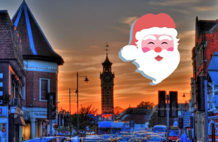 Santa Claus in sky around Epsom Clocktower
