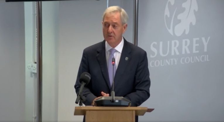 Council Leader Tim Oliver speaking at full council meeting October 8. (Credit: Surrey County Council live stream)