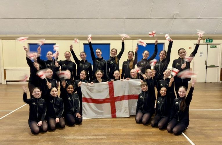 Chamille Dance Group waving England flags