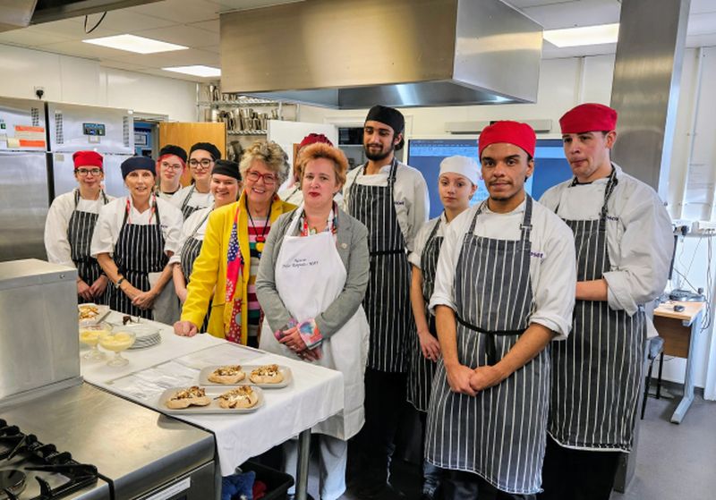 Prue with Julie and students in the Nescot professional kitchens. NESCOT