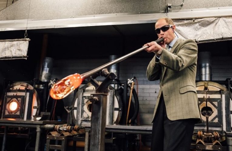 Duke of Edinburgh blows glass at Epsom's UCA workshop
