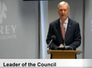 Leader of Surrey County Council, Cllr Tim Oliver, making his speech at full council. (Credit: Surrey County Council webcast)