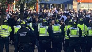 Protestors face police in Epsom