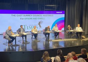 Hustings platform - L to R Buton, Persand, Kington, Blackman, Geliet, Grunwald, Cronin