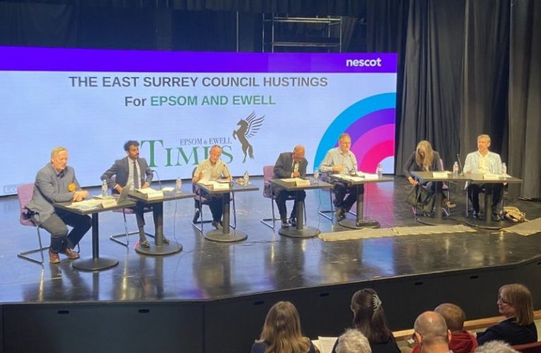 Hustings platform - L to R Buton, Persand, Kington, Blackman, Geliet, Grunwald, Cronin