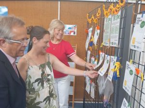 rom left to right: Chair of the Community & Wellbeing Committee, Councillor Clive Woodbridge, Mayor of Epsom & Ewell, Councillor Lucie McIntyre and Epsom & Ewell Refugee Network Lead, Jo Sherring.