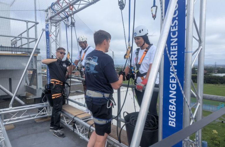 Heart attack survivor abseils hospital with Epsom NHS daughter